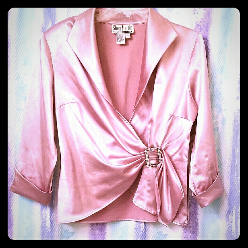 Pink Polyester silk looking stylish blouse.